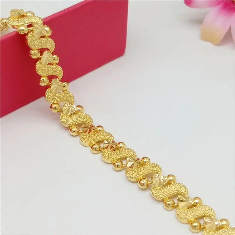 S Shape With Flower And Heart Pattern Golden Chain Bracelet