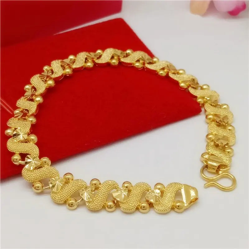 S Shape With Flower And Heart Pattern Golden Chain Bracelet
